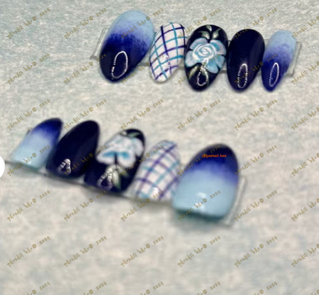 Blue ombre and floral nail art design