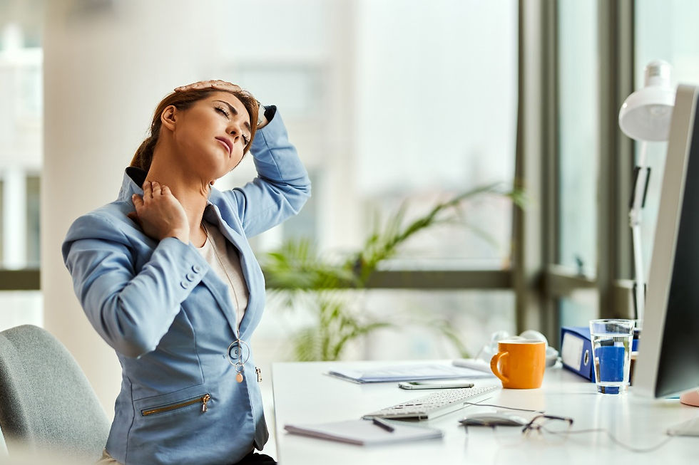 Woman stretching neck to relieve neck pain