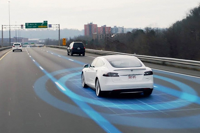 Het vasthouden van de mobiele telefoon in een “zelfrijdende” auto, mag dat?