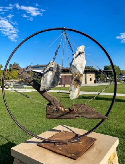 Dream, a marble steel and wood sail sculpture by Byron Ramos at Taylorsville Centennial Plaza