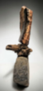 Marbled red. brown, and pink stone sculpture sail with driftwood and foundry brick base by Utah Fine Artist Sculptor Byron Ra