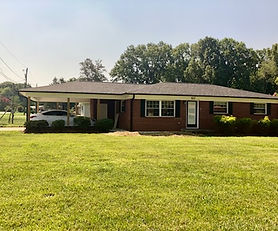 Beautiful Brick Home Just Totally Remodeled with 2 car carport, outbuilding and all kitchen appliances!