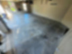 Concrete floor preparation for epoxy installation in Atlanta using professional-grade tools.