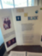 A white poster board with an important presentation on the history of the Men in Black franchise.