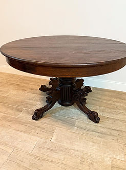 Refinsihed and restored antique lion head table