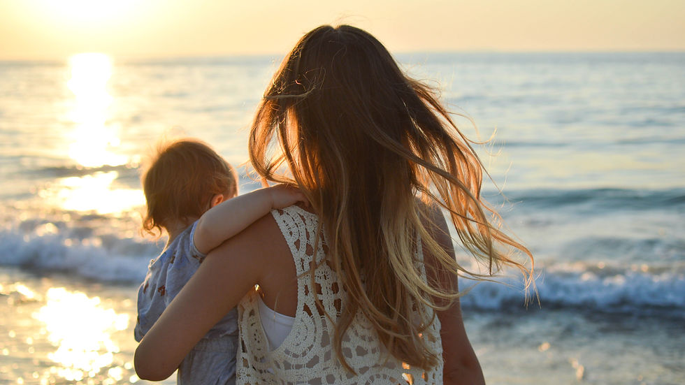 A mum holding a child
