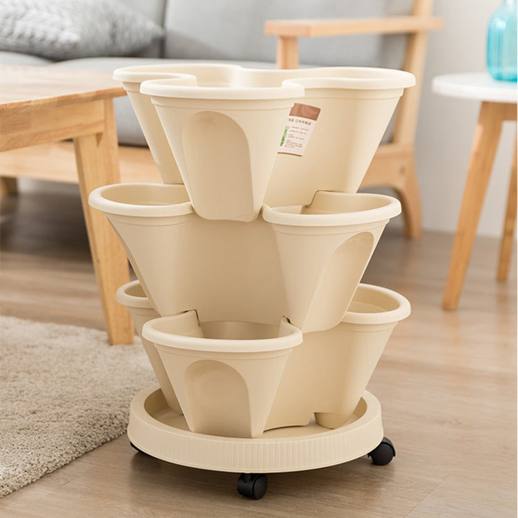 Thumbnail: Set of three Stackable Petal Flower Pots Ivory