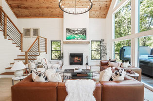 The Everwoods Lodge Cabin Rental living room with wood burning fireplace Hocking Hills Ohio