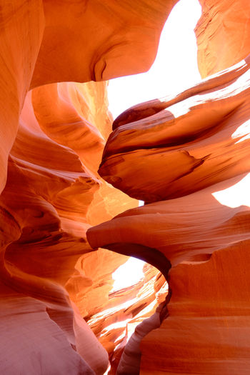 Beam of light shining through rocks 