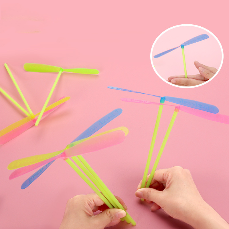 Thumbnail: 5/30Pcs Plastic Bamboo Dragonfly Shape Hand Push Flying Propeller Outdoor Sports