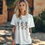 Thumbnail: Cowboy Skeletons Halloween Graphic T-Shirt: Boot Scootin' Boogie
