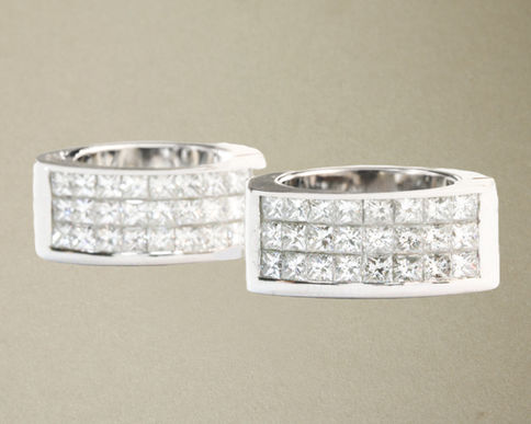 The Princess Grid Diamond Earrings showcased on a nice taupe background