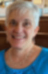 25 Year Volunteer of CONTACT Helpline, posing for a headshot for her interview