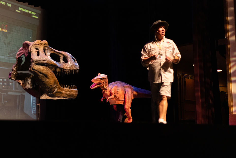 T rex skull and Ranger Martin, Rockie the T rex in the background