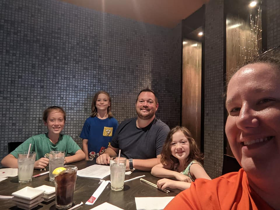 Plowman family photo while dining out celebrating Brynn's Kindergarten graduation.