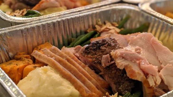 A Container Full of Thanksgiving Food
