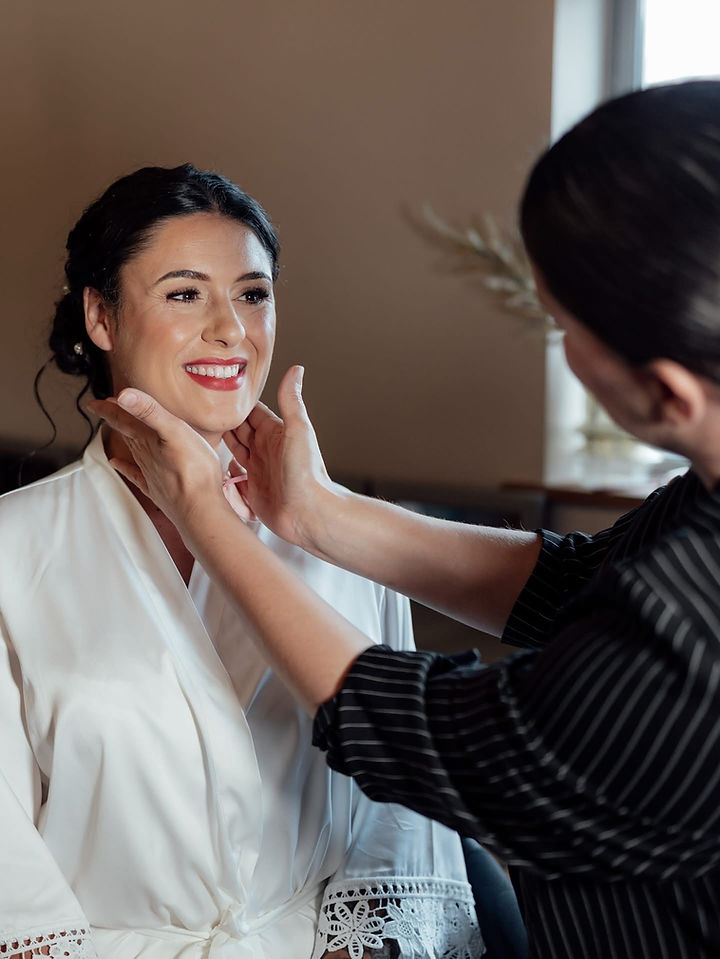makeup artist and bride
