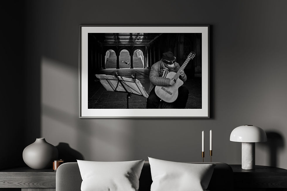 Photo in a wall art mockup with a black frame