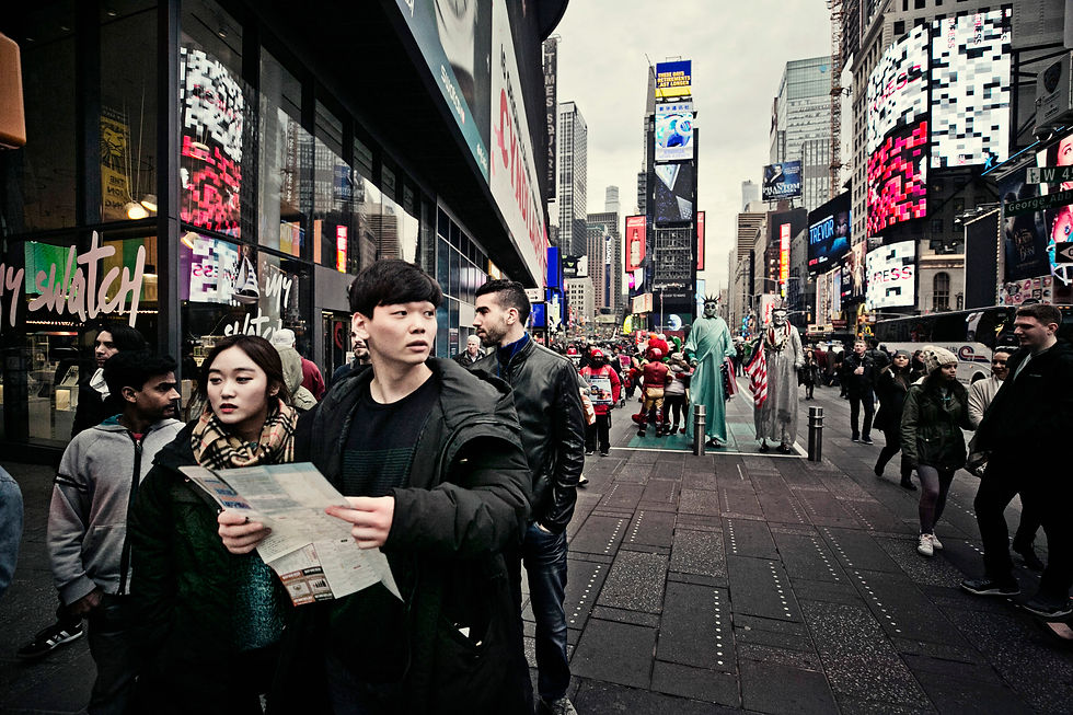 Tourists looking at a map in Times Square. New York City