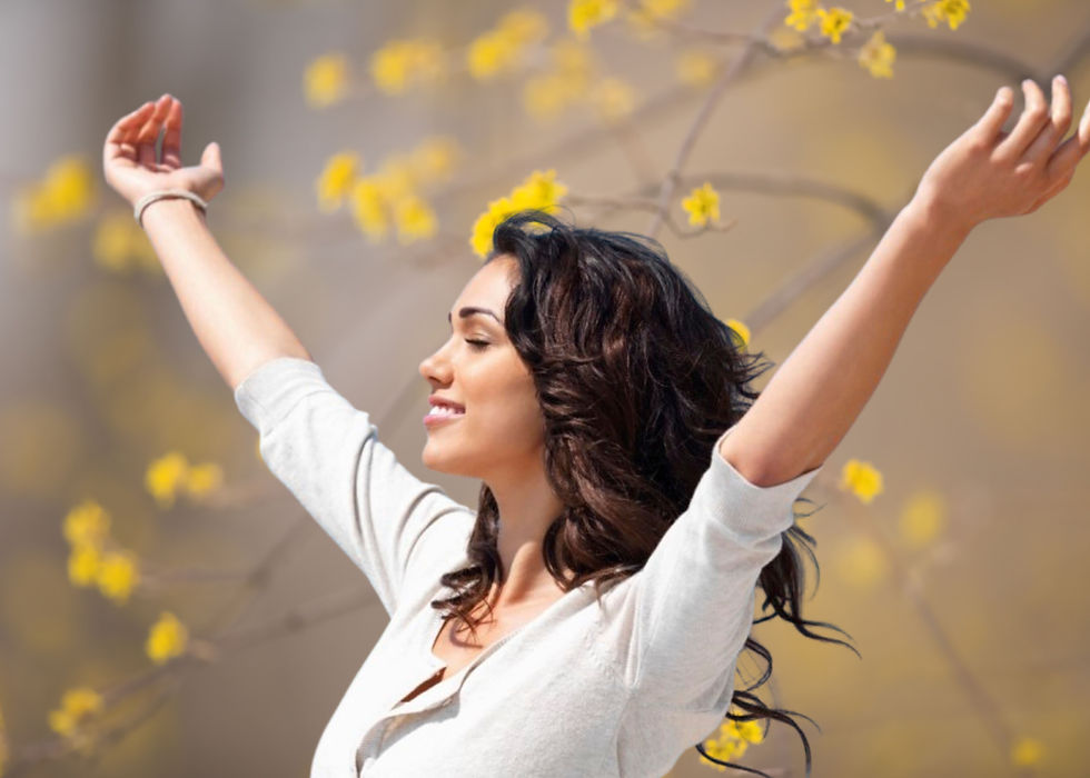 Woman with arms lifted