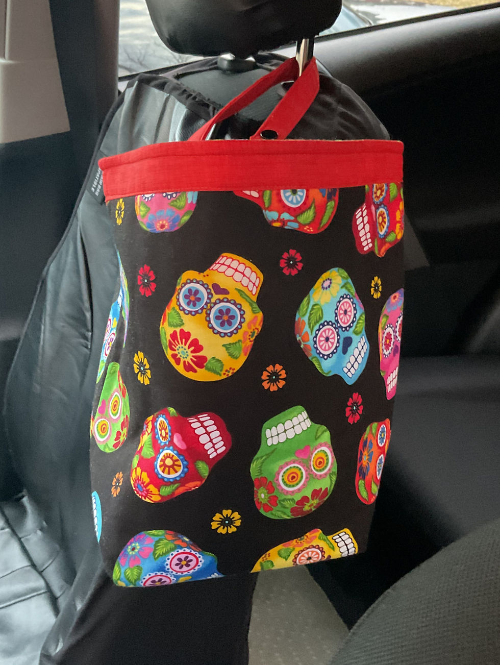 Thumbnail: Sugar Skull hanging from headrest.