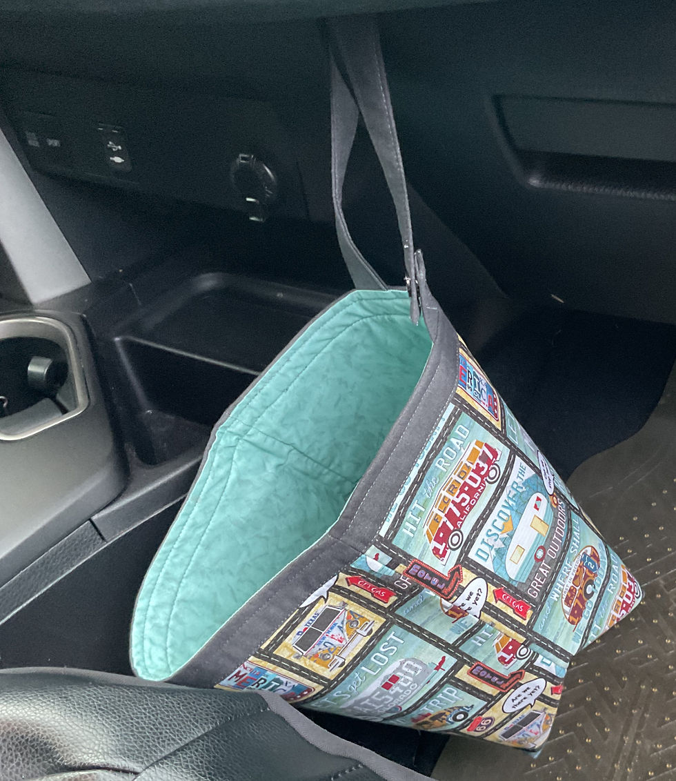 Thumbnail: Miles To Go hanging from glove compartment.