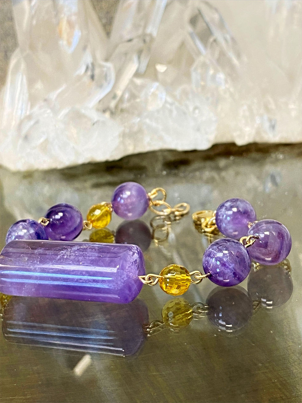 Bracelet en Améthyste et citrine. or