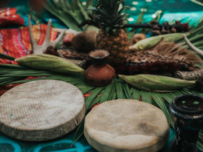 A sacred altar set with natural offerings and ceremonial drums, capturing the essence of a detox retreat blessing at Lunita Jungle Retreat Center, Mexico.