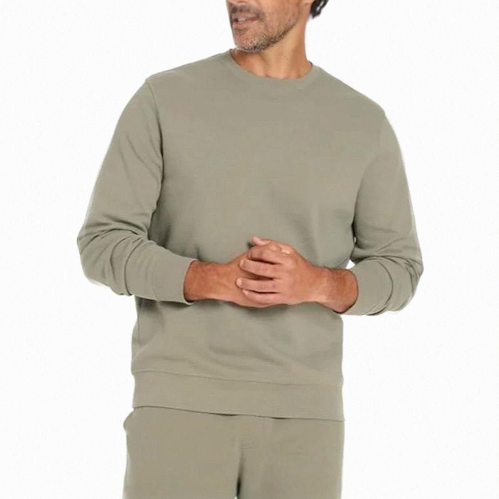 Man in sage green crewneck sweatshirt and joggers