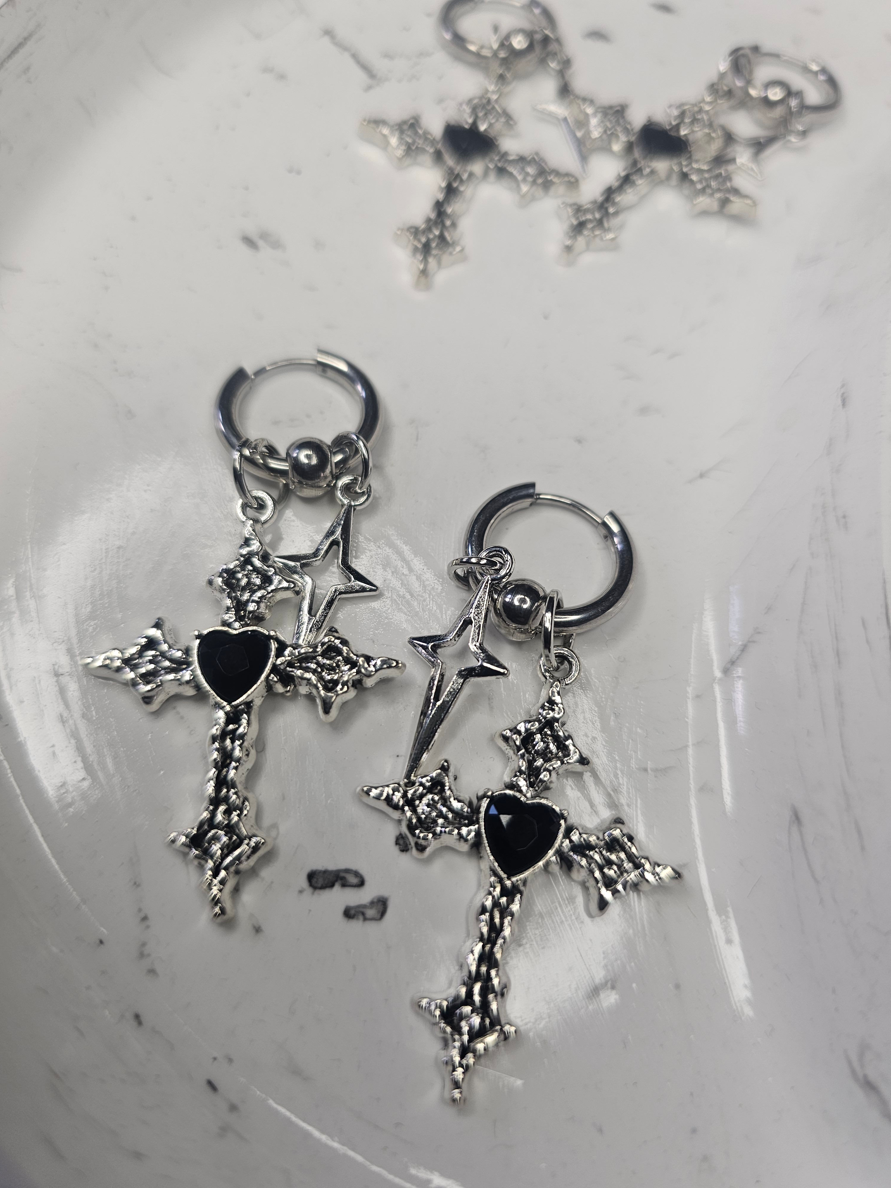 Ornate cross and star huggy hoops