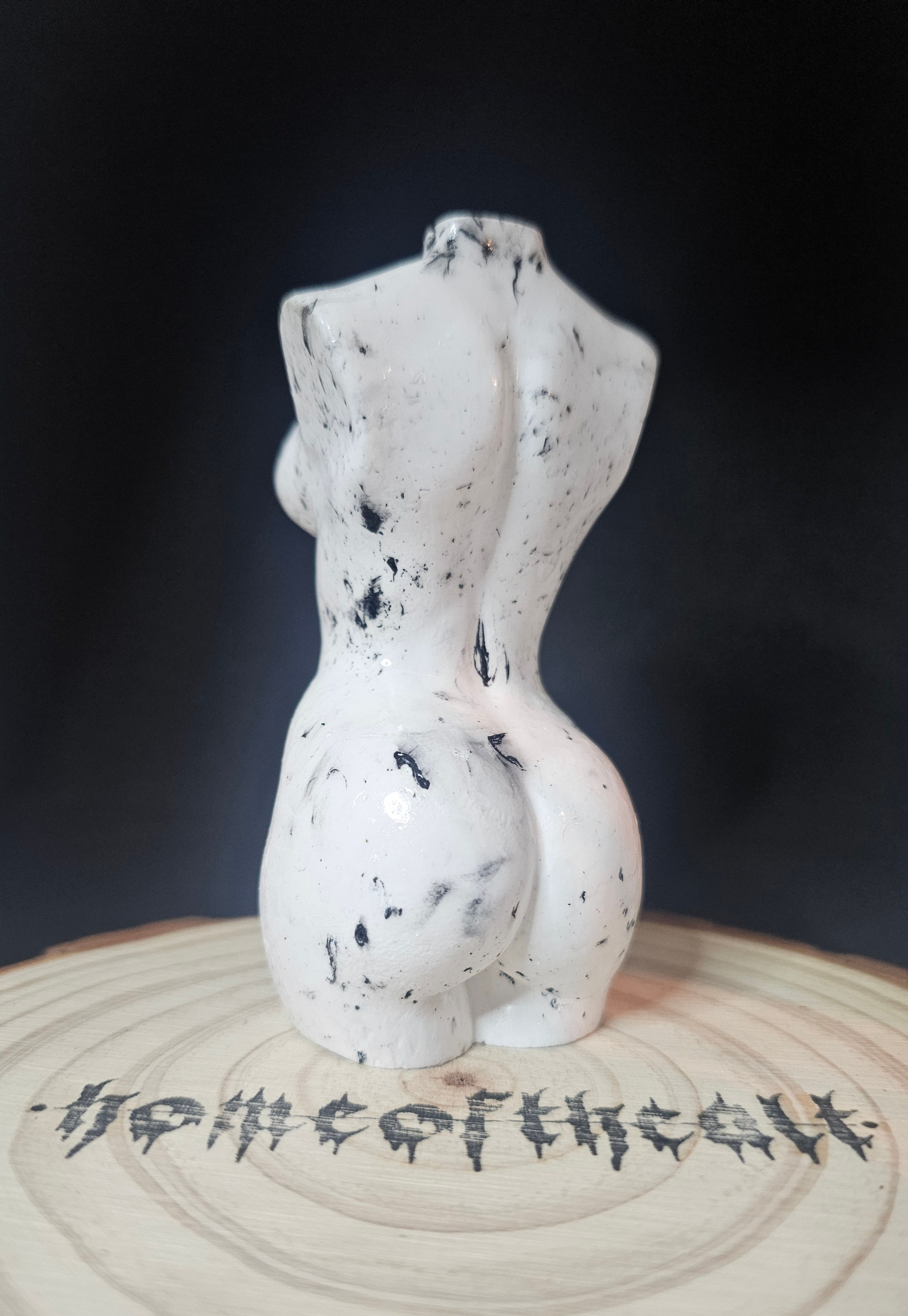 Lightly speckled monochrome goddess