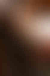 Jesmond Dene House wedding ceremony, with autumnal registrar / signing table wedding flowers which will later be transferred to the top table