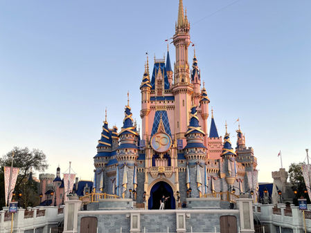 Cinderella Castle in her 50th anniversary pink blue and gold glow-up