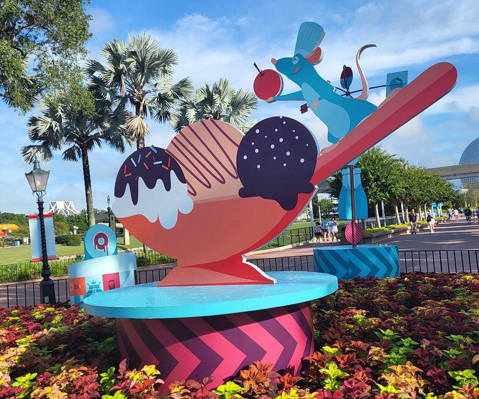 Food & Wine Festival decoration featuring Remy eating ice cream holding a cherry