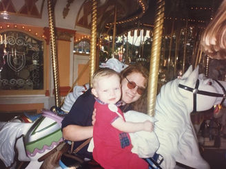 Mom and Baby on the Carousel at the Magic Kingdom