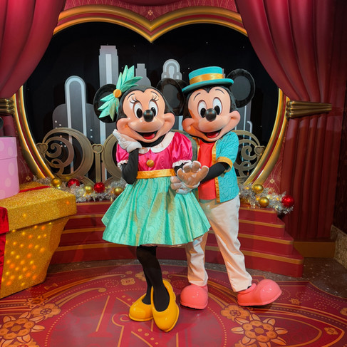 Mickey and Minnie holiday outfits during rainy Jollywood Nights at Hollywood Studios