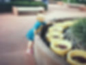 Lyn playing the in fountains outside of the Journey into Imagination Pavilion in 1994