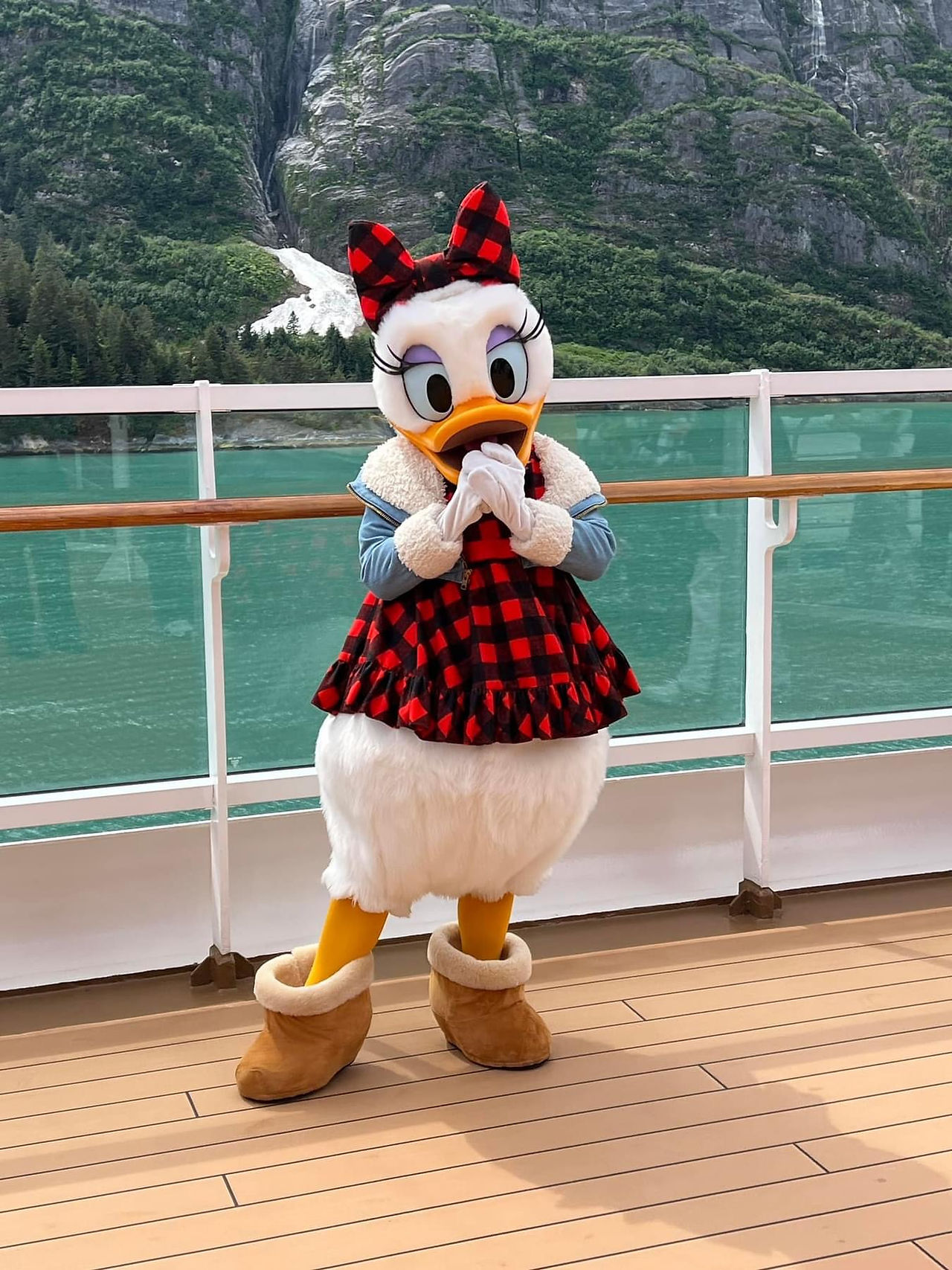 Daisy Duck in her Glacier Day Outfit on the Disney Wonder