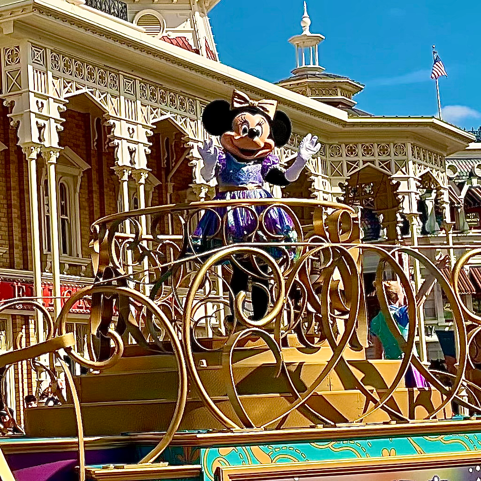 Minnie Mouse on a float at Festival of Fantasy Parade in the Magic Kingdom