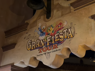 Gran Fiesta Tour sign with the Three Caballeros above the words
