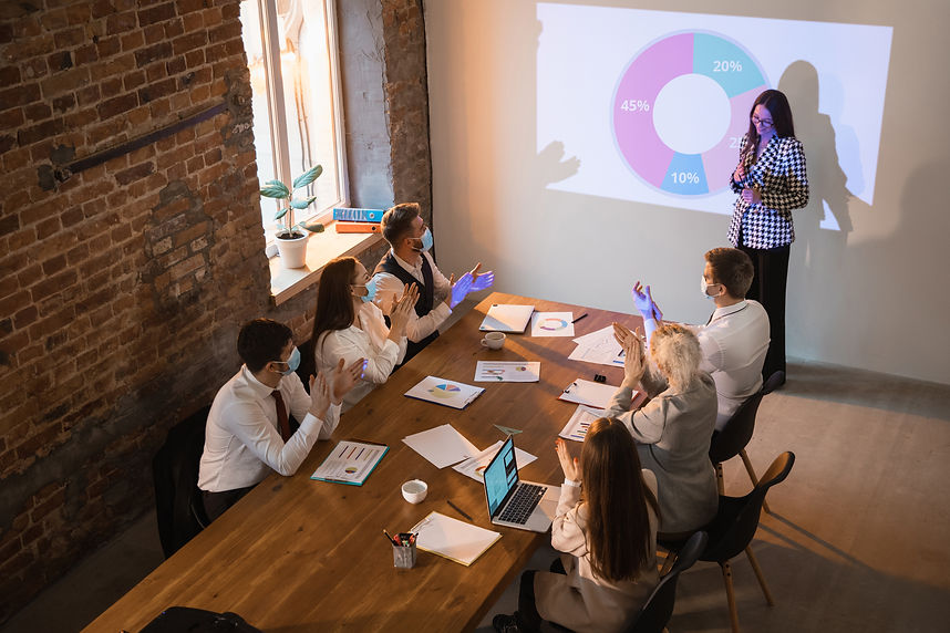 speaker-giving-presentation-meeting-room.jpg