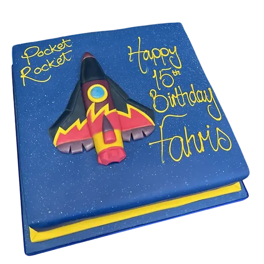 Bespoke rocket-shaped cake with vibrant red and white detailing, crafted in Solihull, West Midlands for celebration.