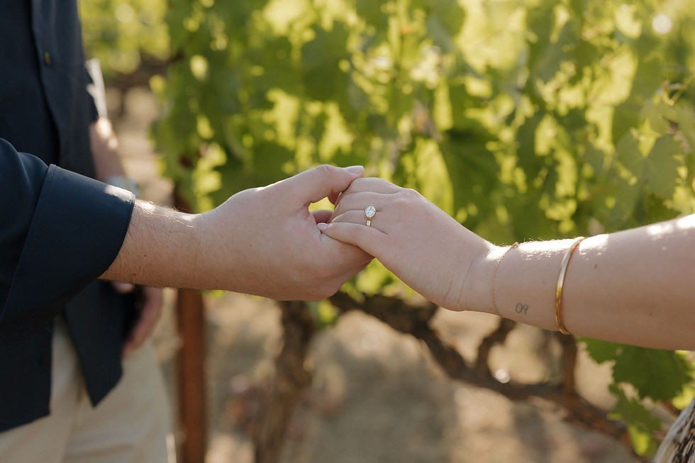 Close-up of Jade's unique east-west engagement ring