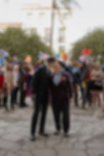 Santa Barbara Weddings vow renewal ceremony with family gathered around by Santa Barbara courthouse photographer Mackenzie Rana