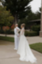 Bride sharing private first look with dad before Cypress Ridge Wedding