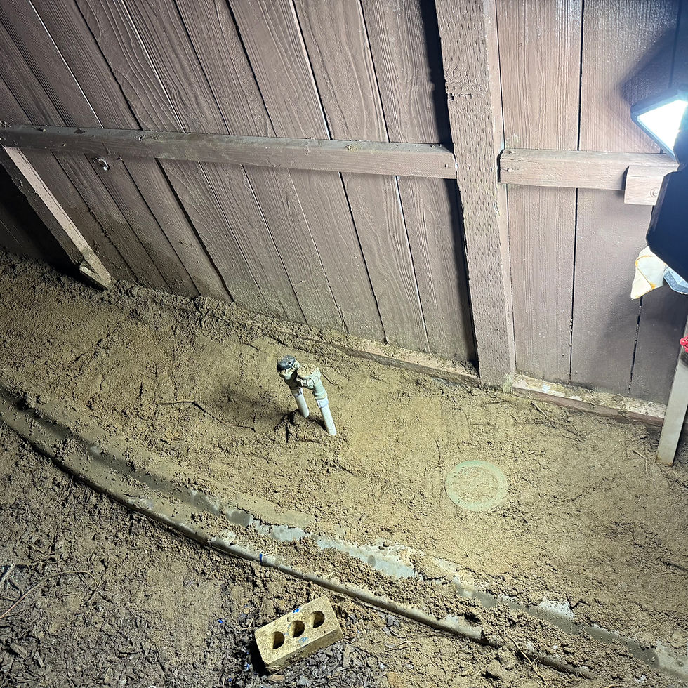 Completed emergency pipe repair by a plumber in Murrieta, showing a newly installed outdoor shut-off valve and filled dirt trench.