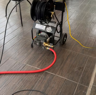 Our fume-free electric hydro jetter set up and ready to clear an indoor line.