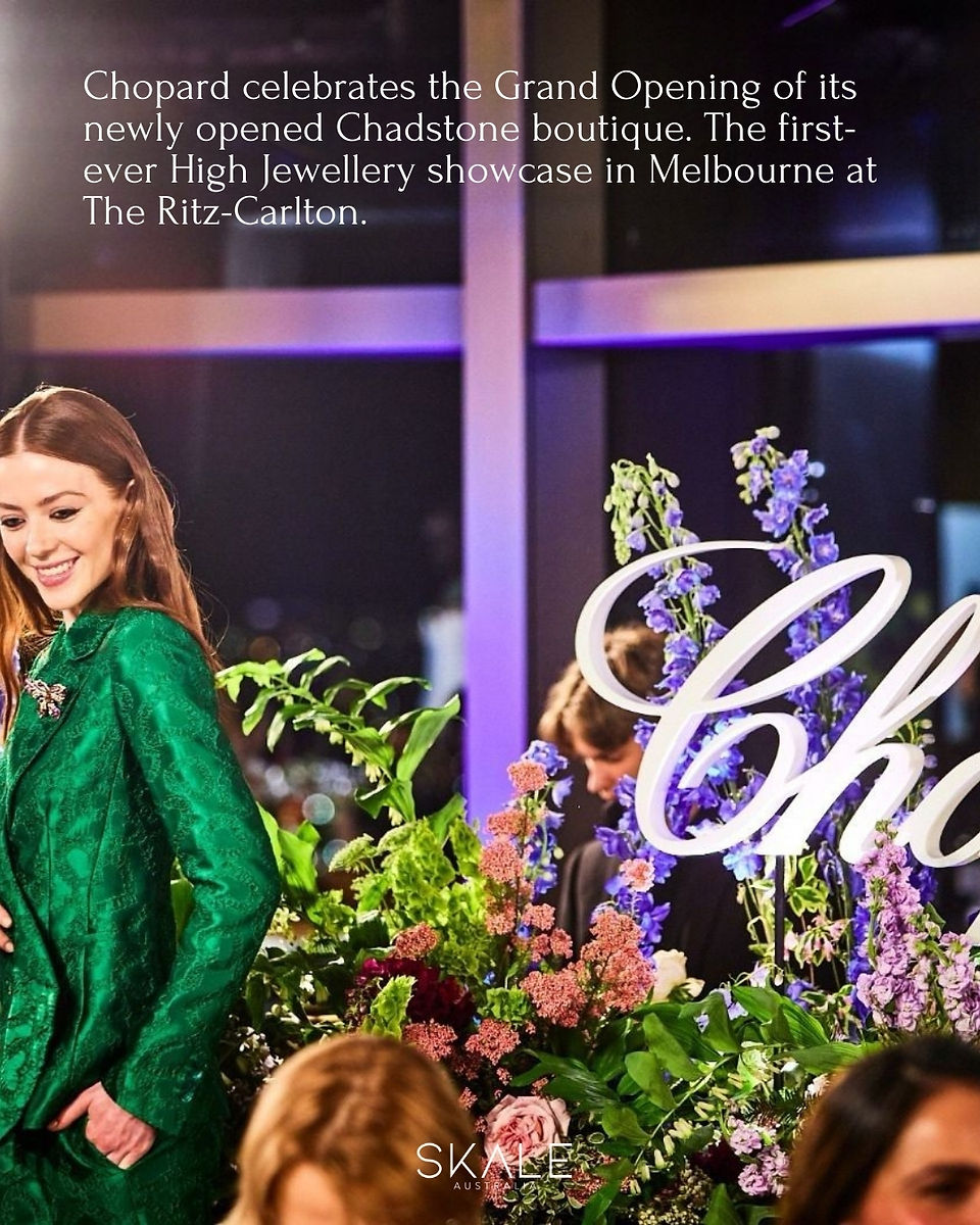 Chopar logo model wearing High Jewellery and green dress