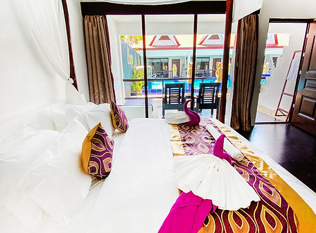 Tropical pool access suite with king-size bed and direct swimming pool access in Puerto Princesa Palawan