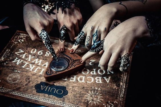 Three witches and a ouija board
